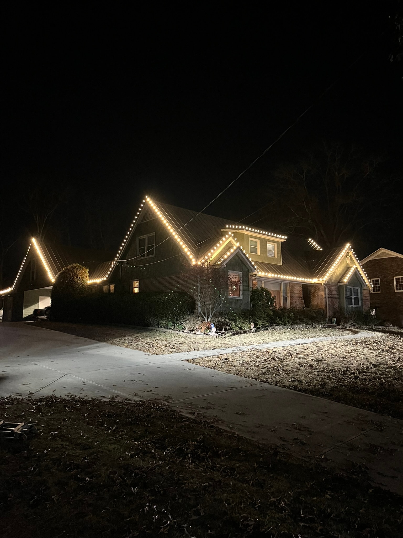 House decorated with holiday string lights